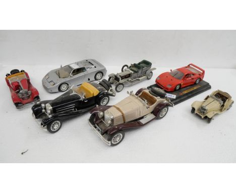 A collection of Burago model cars including Ferrari and Bugatti 