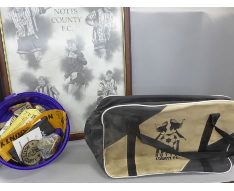 A large collection of vintage Notts County Football Club collectables and supporters related items, scarves, tops, badges, a 