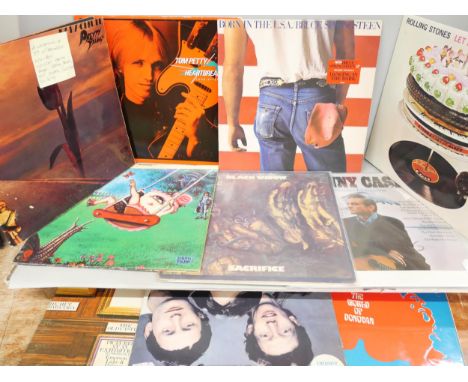 A collection of 39 LP records 1960's-80's including Pretty Things, Rolling Stones, ELP, Queen, Sacrifice and Tom Petty