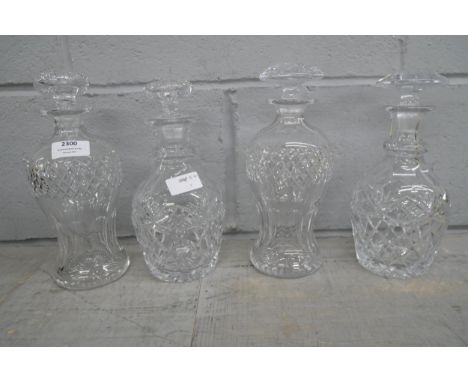 Four cut glass decanters all with stoppers  **NOT ELIGIBLE FOR IN HOUSE POSTAGE AND PACKING** 