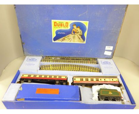 A Hornby Dublo electric model railway locomotive, Duchess of Montrose. Including railway track, two carriages and a wagon. In