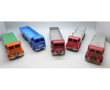 Four Dinky Supertoys model lorries, including Foden and Leyland Octopus, and one other model lorry, some repainted.