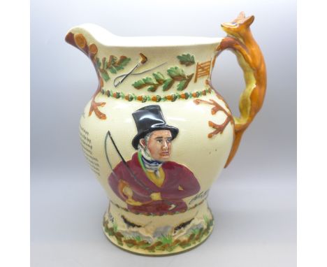 A Crown Devon Fielding's musical pitcher featuring John Peel and hunting scenes, with fox handle. Rd No 755789. Approximately