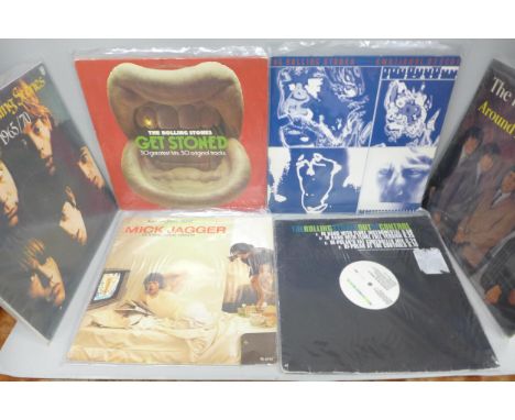 Twelve LP records, Rolling Stones, The Who, Fleetwood Mac, Mick Jagger, etc.