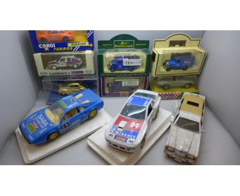 A collection of model vehicles including a gold tone Corgi Classics Morris Minor, A Dad's Army Days Gone model vehicle, etc.
