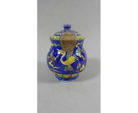 An Unopened Chinese Ceramic Tea Caddy decorated with Birds in Blue, Yellow, Green and Brown Enamels. Original Paper Seal Inta