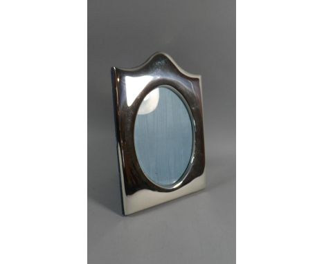 A Large Silver Easel Backed Photo Frame. 20.5x30cms 