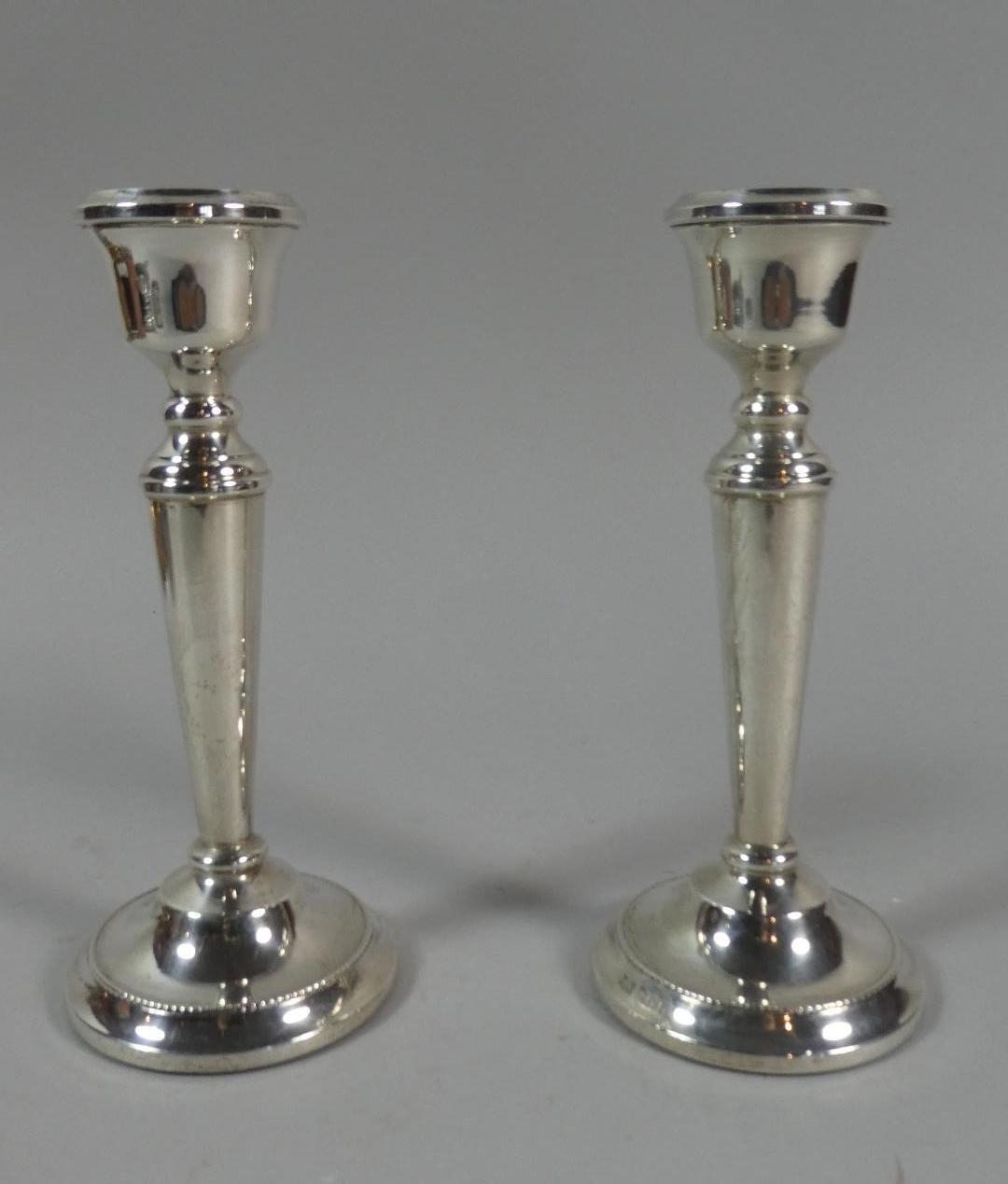 A Pair of Silver Candlesticks. Birmingham Hallmark. 15.5cms High