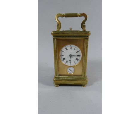 A French Brass Cased Carriage Clock with White Enamel Dial inscribed Paul Garnier. Subsidiary Alarm Dial and Repeater Movemen