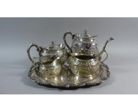 A Four Piece Silver Plated Tea Service by M H and Co, Retailed by Schierwater and LLoyd with Unrelated Tray.