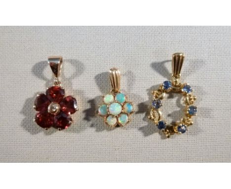 9ct GOLD GARNET AND DIAMOND PENDANT, 9ct GOLD OPAL PENDANT AND A 9ct AMETHYST OVAL PENDANT (4.0g GROSS) [3]