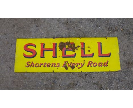 A SHELL 'SHORTENS EVERY ROAD' RECTANGULAR ENAMEL SIGN (46 cm x 137 cm)