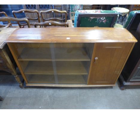 An Ercol style oak bookcase