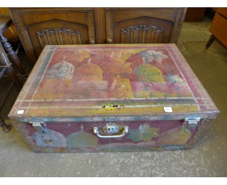A painted tin trunk