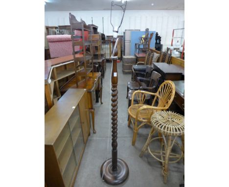 An oak barleytwist standard lamp