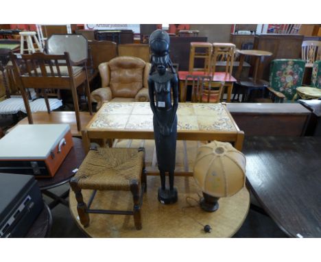 A 1950's table lamp, ebonised African figure, etc.