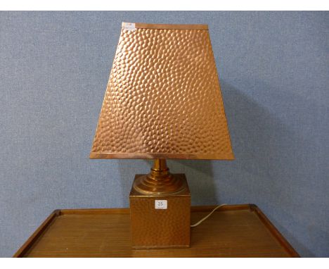 A copper table lamp