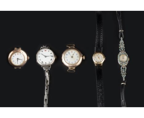 A WATCH HEAD BY ROLEX, the tonneau-shaped silvered dial with Arabic numerals and blued steel hands, to signed jewelled manual