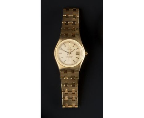 A LADY'S 18T GOLD 'SEAMASTER' QUARTZ WRISTWATCH BY OMEGA, the circular gilt dial with baton markers and date display, to case
