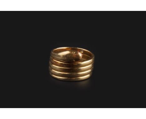 A LATE VICTORIAN SERPENT RING, of coiled design, the interior inscribed 'Dec 22 1896' and stamped '18', ring size approximate