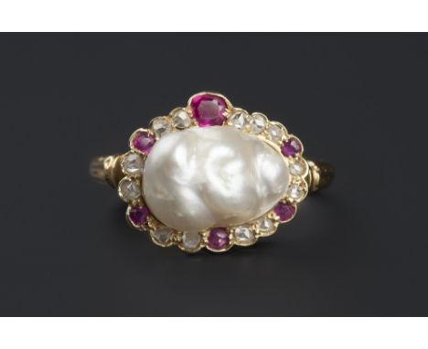 A NATURAL BLISTER PEARL, RUBY AND DIAMOND RING, the baroque blister pearl framed by a shaped border of cushion and circular m