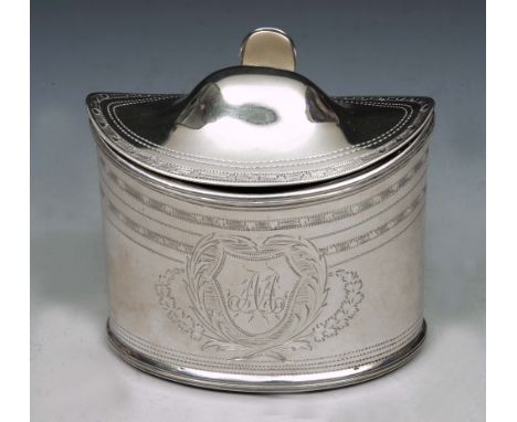 A GEORGE III SILVER MUSTARD POT, oval shaped with engraved decoration and cartouche, matching domed hinged lid and blue glass