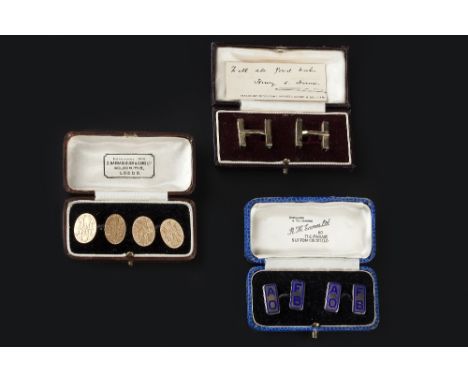 THREE PAIRS OF CUFFLINKS, comprising a pair of 15ct gold oval panel cufflinks, monogrammed, a pair of white metal and blue en