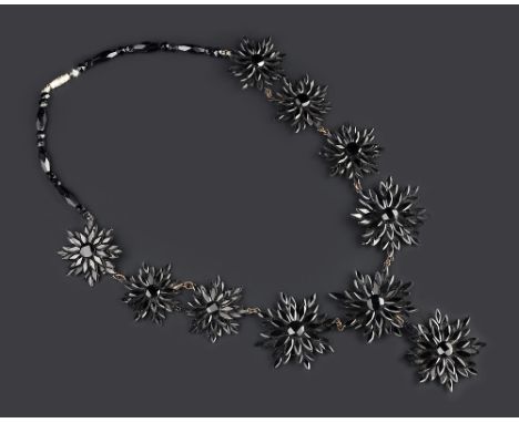 A COLLECTION OF ANTIQUE JEWELLERY, comprising a Victorian locket pendant, on a jet baton and bead-link chain, a black beaded 