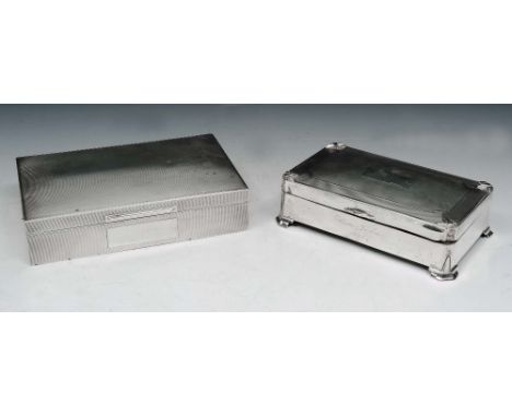 A CEDAR LINED SILVER CIGARETTE BOX with engine turned decoration, 17cm long, Birmingham 1955, makers mark J.P.; and a further