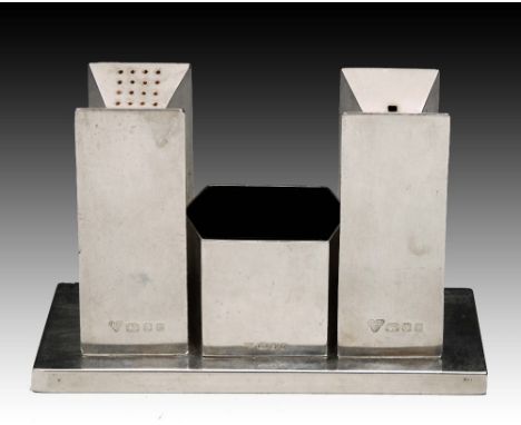 A CONTEMPORARY SILVER THREE PIECE CRUET SET AND STAND of architectural form with fluted sides and standing on a rectangular b