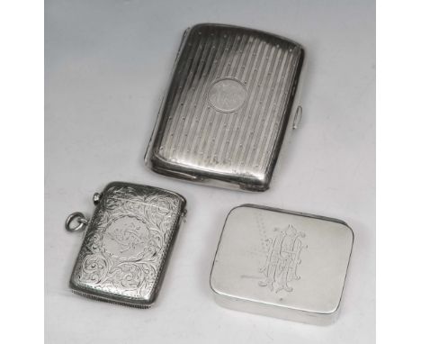 A SILVER VESTA CASE with engraved foliate decoration, Chester 1898, by William Neale; a rectangular shaped silver match holde
