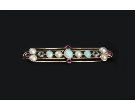 A VARI GEM-SET PANEL BROOCH, the linear pierced bar spaced by millegrain collet set cabochon opals, half pearls, cushion-shap