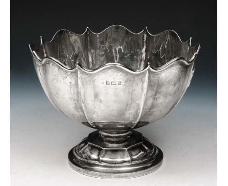 AN EDWARDIAN SILVER ROSE BOWL with fluted sides and matching foot, 21cm diameter, Birmingham 1907 by A & J Zimmerman Ltd, 14.