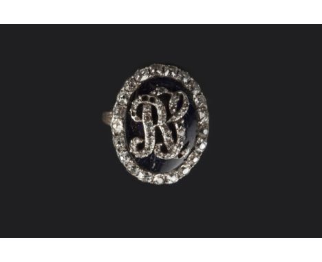 A GEORGIAN DIAMOND AND ENAMEL MEMORIAL RING, the oval panel applied with an old and rose-cut diamond set monogram to a blue e