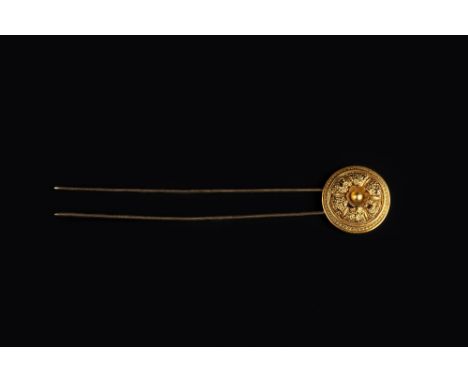 AN ARCHAEOLOGICAL REVIVAL AIGRETTE, circa 1860, the circular panel of bombé form, depicting a cluster of graduated flowerhead