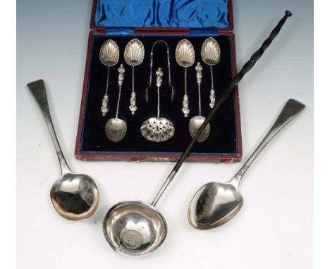 A GEORGIAN SILVER MOUNTED PUNCH LADLE with inset George II silver shilling dated 1757, with a twisted whale bone handle, 36cm