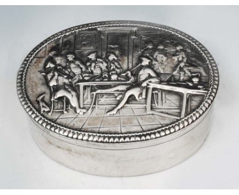 A GEORGE III SILVER TOBACCO TIN, oval shaped with a hinged lid and a chased inn scene, 9cm long, London 1785 by possibly Thom