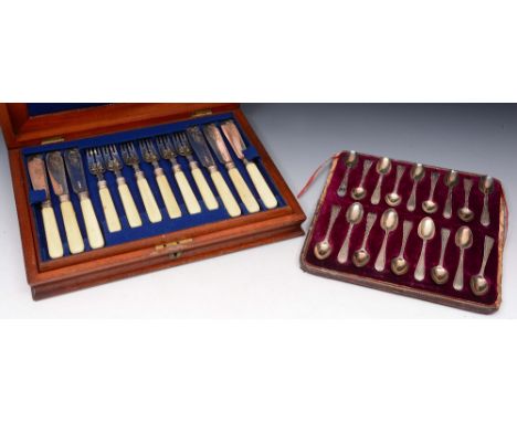 A MAHOGANY CASED SET OF TWELVE SILVER AND IVORY HANDLED FISH KNIVES AND FORKS, London 1873 by Henry Wilkinson; and a cased se