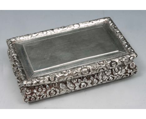 A GEORGE III SILVER SNUFF BOX with cast foliate decorated sides, hinged lid with part engine turned decoration, Birmingham 18