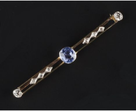 A SAPPHIRE AND DIAMOND BAR BROOCH, the cushion-shaped mixed-cut sapphire of lilac/light purple hue, millegrain collet set to 