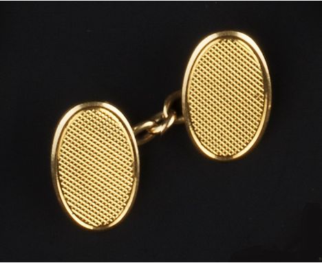 A PAIR OF 18CT GOLD CUFFLINKS, each oval panel with chequered engine-turned decoration, with chain-link fittings, panel lengt