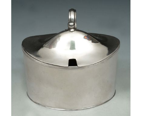 A GEORGE III SILVER MUSTARD POT of plain oval form with a domed hinged lid and blue glass liner, 9.4cm wide, London 1796 by D