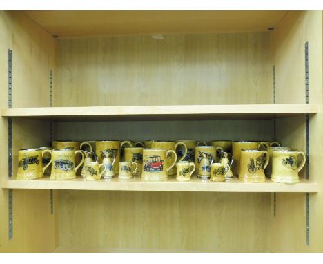 A shelf full of mugs decorated with images of motorcars.