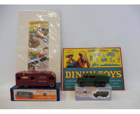 Dinky Supertoys - horsebox, no. 581, medium artillery tractor no. 689 and two Dinky Toys display cards. 