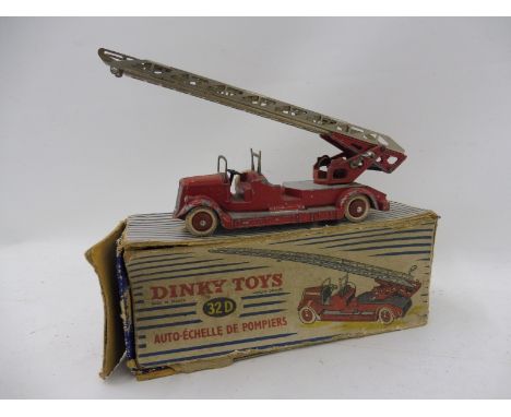 A boxed French Dinky Toys model of a fire engine, no. 32D. 
