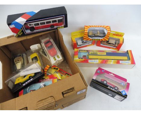 A collection of boxed Solido vehicles.