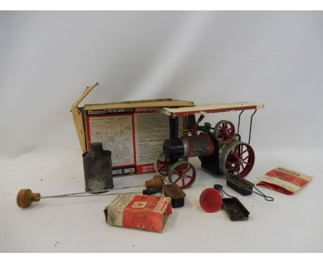 A Mamod steam tractor.