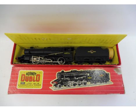A boxed Hornby Dublo LMR 2-8-0 8F locomotive and tender, LMR 48073 in black, spanner and packing piece included. 