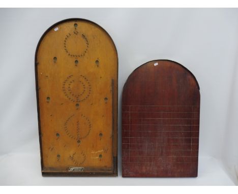 A Corinthian bagatelle board and a shove ha'penny board.