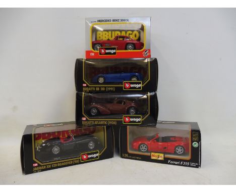 A selection of boxed Burago and Maisto models to include a Jaguar XK120, Bugatti etc.